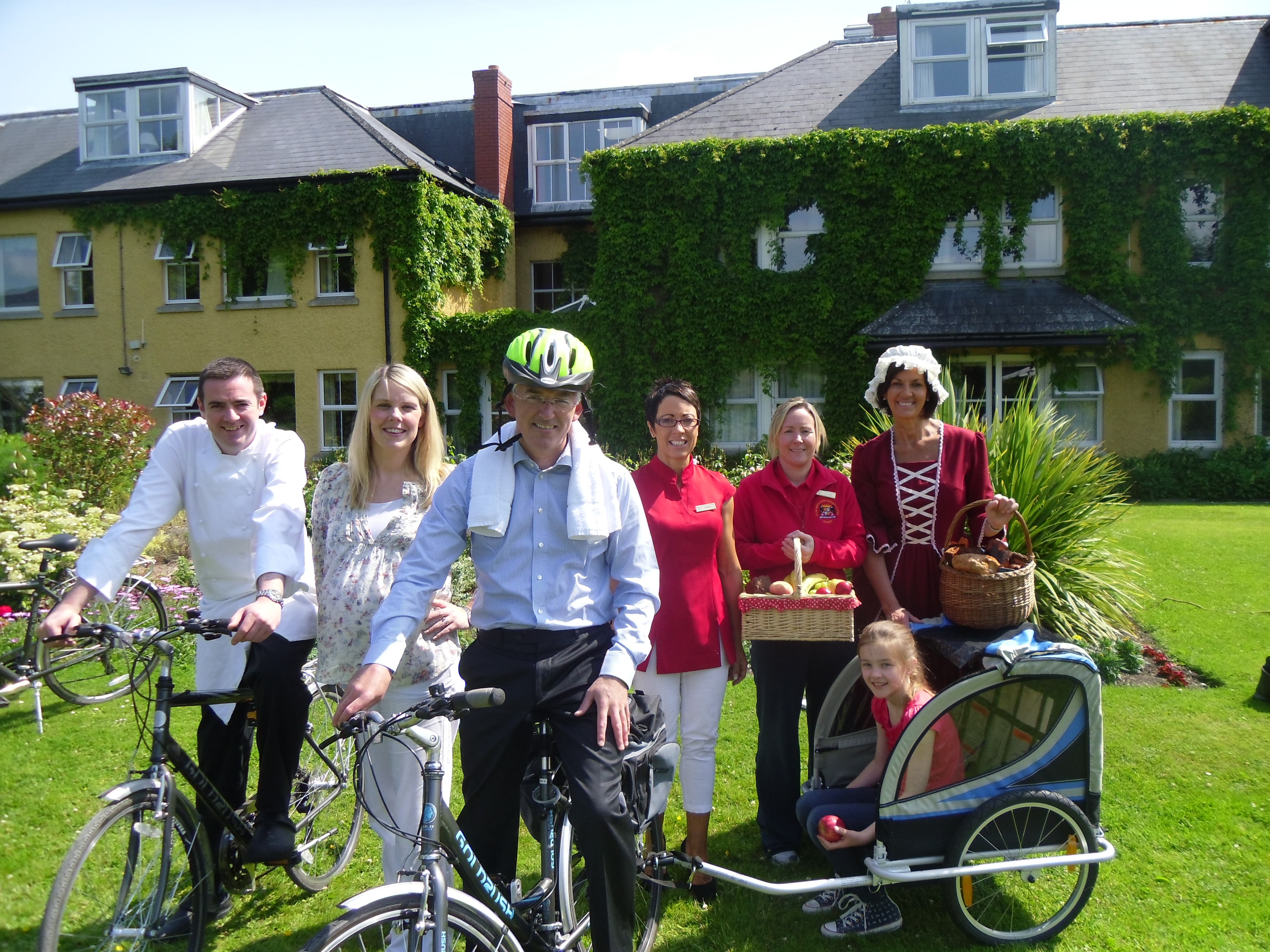 Pictured in the photo taken in the Garden of the Dunraven Arms Hotel are Louis Murphy, Proprietor, Dunraven Arms Hotel, Hotel Guests and Staff