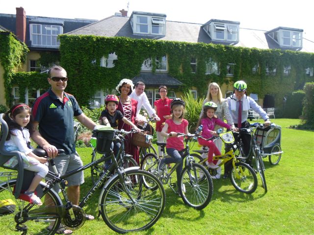 Pictured in the photo taken in the Garden of the Dunraven Arms Hotel are Louis Murphy, Proprietor, Dunraven Arms Hotel, Hotel Guests and Staff